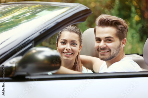 Beautiful couple in car on road trip © Africa Studio