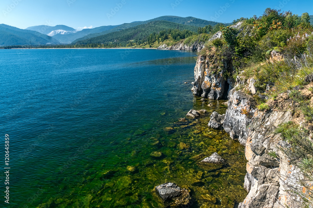 The rocky cliff at Cape Shamansky on Lake Baikal The rocky cliff at Cape Shamansky on Lake Baikal