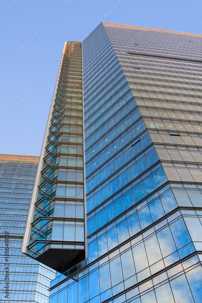 Modern office building with glass surface at dawn. Modern office building with glass surface at dawn.