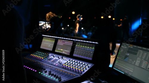 sound engineer work on the audio mixer at a concert