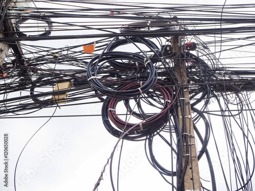 Chaos of cables and wires on electric pole in Chiang Mai,Thailan