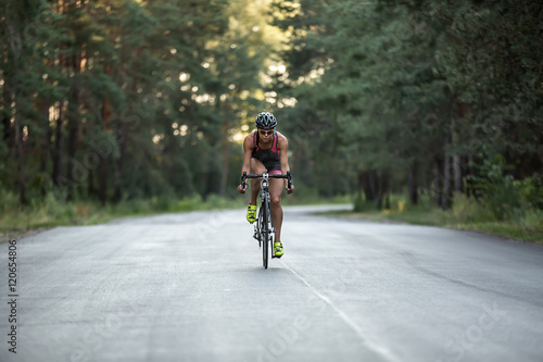 Wallpaper Mural Athletic girl rides a bike Torontodigital.ca