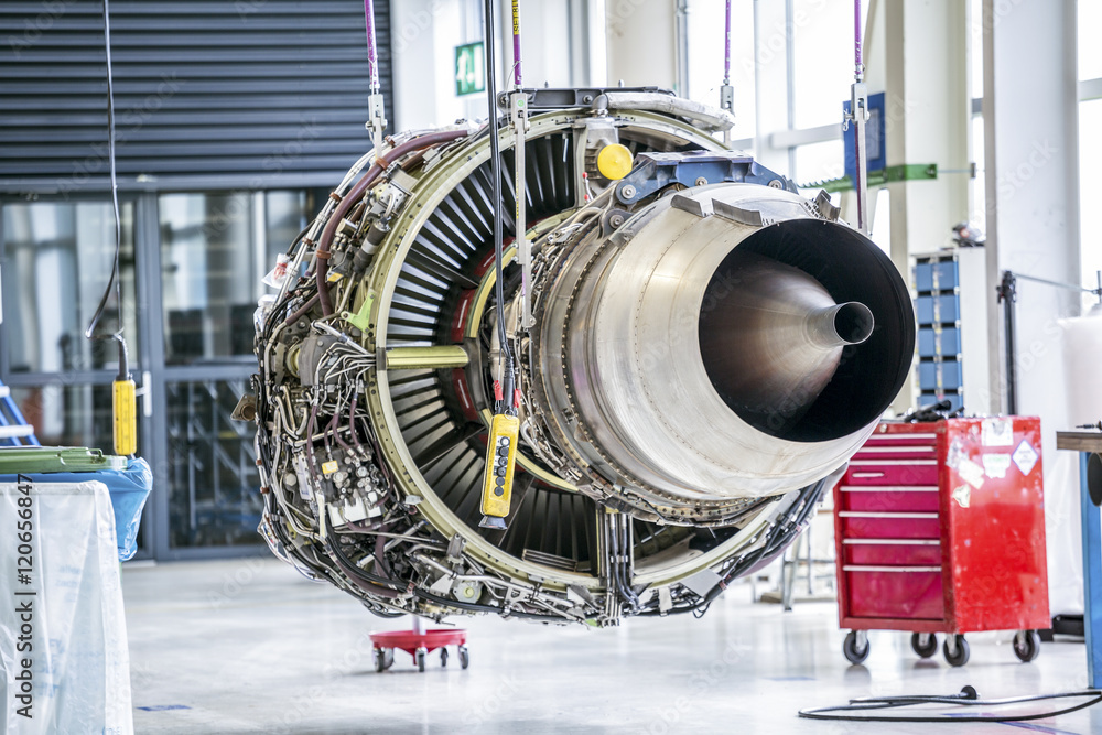 Obraz premium Big airplane engine during maintenance