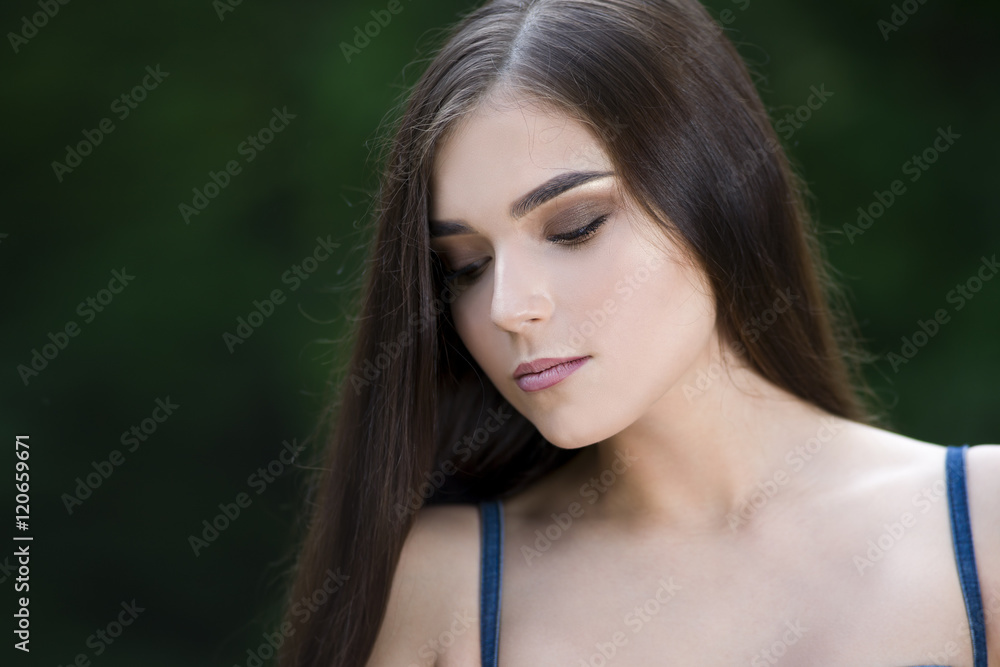 Close-up portrait of a beautiful young caucasian woman with clean skin, long hair and casual makeup Close-up portrait of a beautiful young caucasian woman with clean skin, long hair and casual makeup
