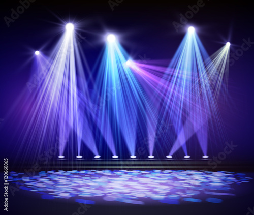 Various stage lights in the dark. Spotlight on stage.