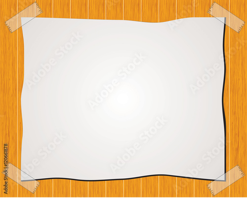 Paper note with sticky tape isolated on wood background
