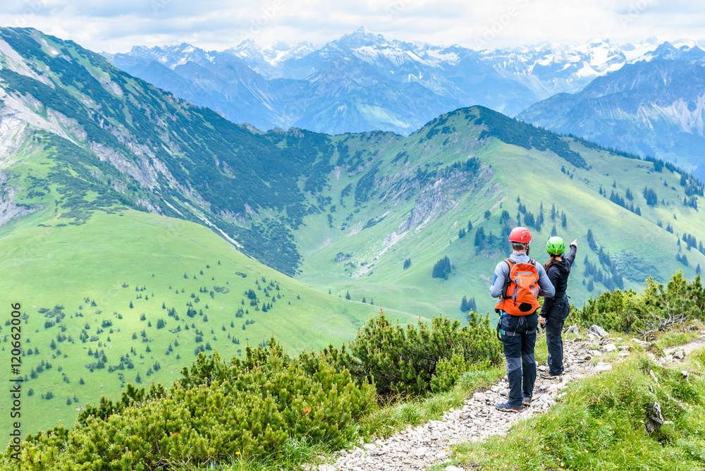 Hiker in beautiful landscape of Alps in Germany - Hiking in the