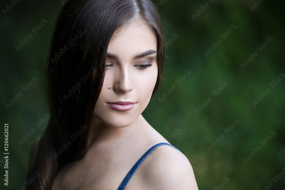 Close-up portrait of a beautiful young caucasian woman with clean skin, long hair and casual makeup Close-up portrait of a beautiful young caucasian woman with clean skin, long hair and casual makeup