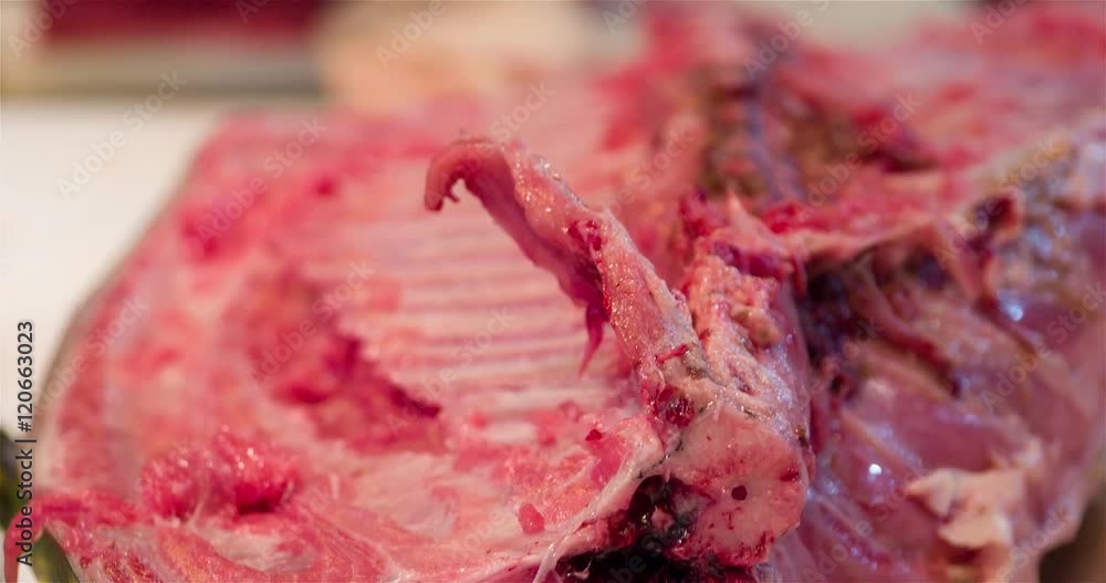 Cut raw bluefin tuna: bones 4k close up bokeh video in sushi restaurant kitchen. Asian japanese cuisine. Cut raw bluefin tuna: bones 4k close up bokeh video in sushi restaurant kitchen. Asian japanese cuisine.