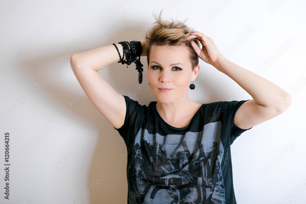 emotional woman in a hat on  white background.  portrait of happy confident successful pretty young woman. Positive human emotions, facial expressions, feelings, attitude
