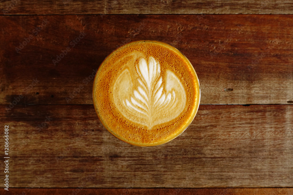 cup of latte art coffee on wooden background cup of latte art coffee on wooden background