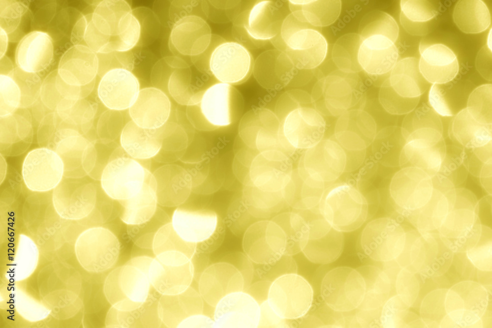 Obraz premium gold abstract background with bokeh defocused lights