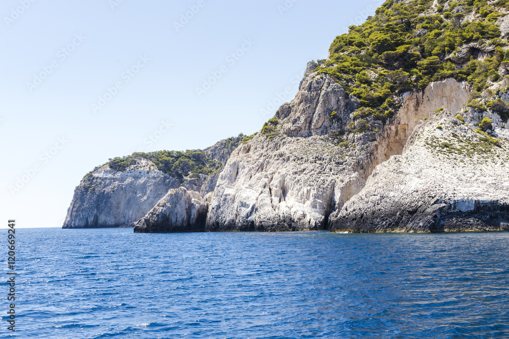 Cruise around Zakynthos, views from the sea on the island, Greece, background.