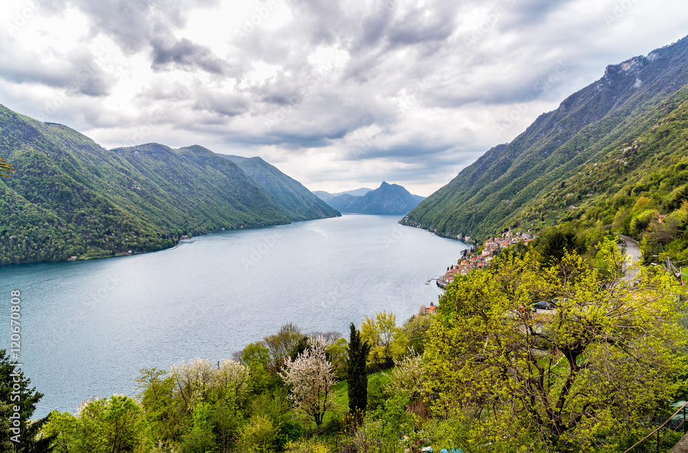 Landscape with Lugano lake and mountains.
