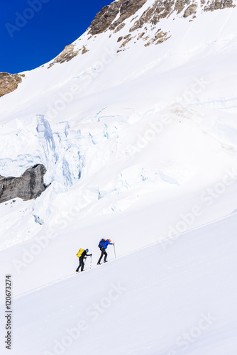 Ice Climbing on glacier in the mountains of Switzerland - Aletsch Glacier © Simon Dannhauer