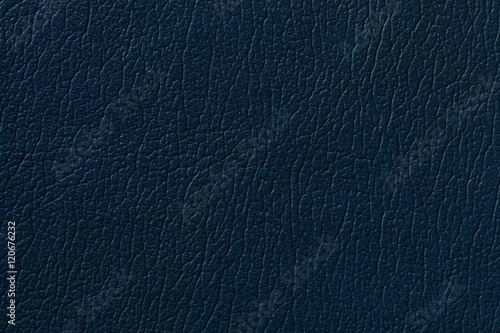 Dark blue leather texture background with pattern, closeup.