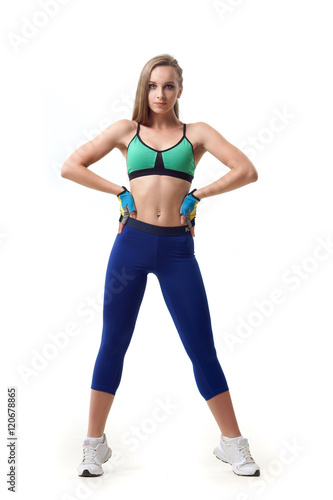 Concepts: healthy lifestyle, sport. Happy beautiful woman fitness trainer working out isolated on white background