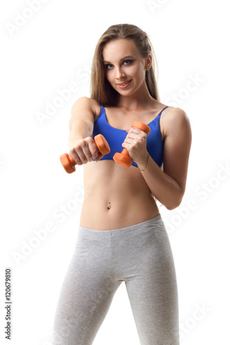 Concepts: healthy lifestyle, sport. Happy beautiful woman fitness trainer working out with small dumbbells isolated on white background