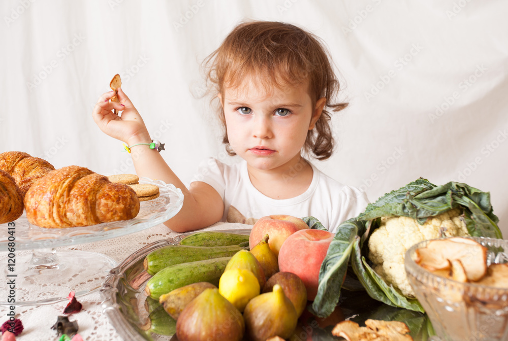 Healthy food for children,little girl eats. Healthy food for children,little girl eats.