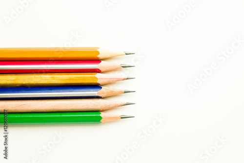 Pencils of different colors are on white.