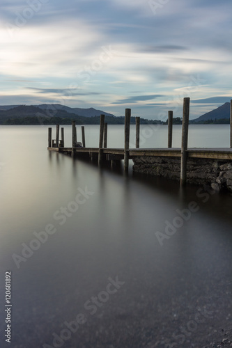 Wallpaper Mural Wooden Jetty with poles leading into Derwentwater Lake in the Lake District, UK. Torontodigital.ca