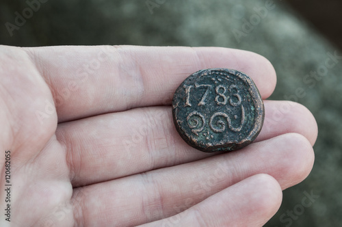 The coin collector found an ancient coin
