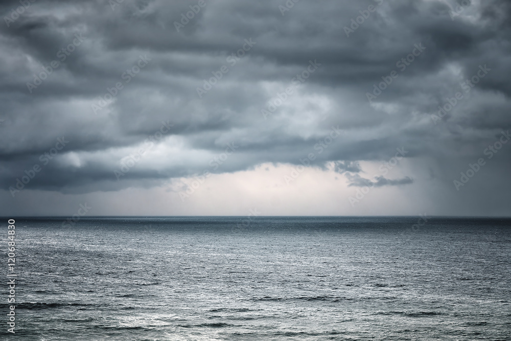 Fototapeta premium rain and stormy cloud over sea