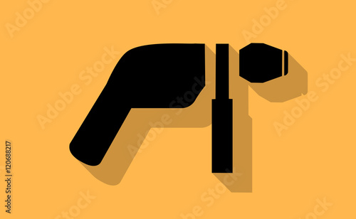 Vector black drill with long shadow on flat background photo