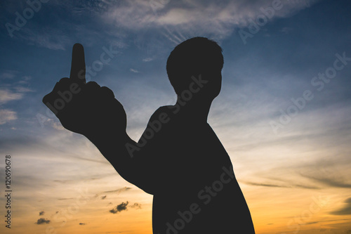 silhouaette with human Hand Gesturing With Middle Finger