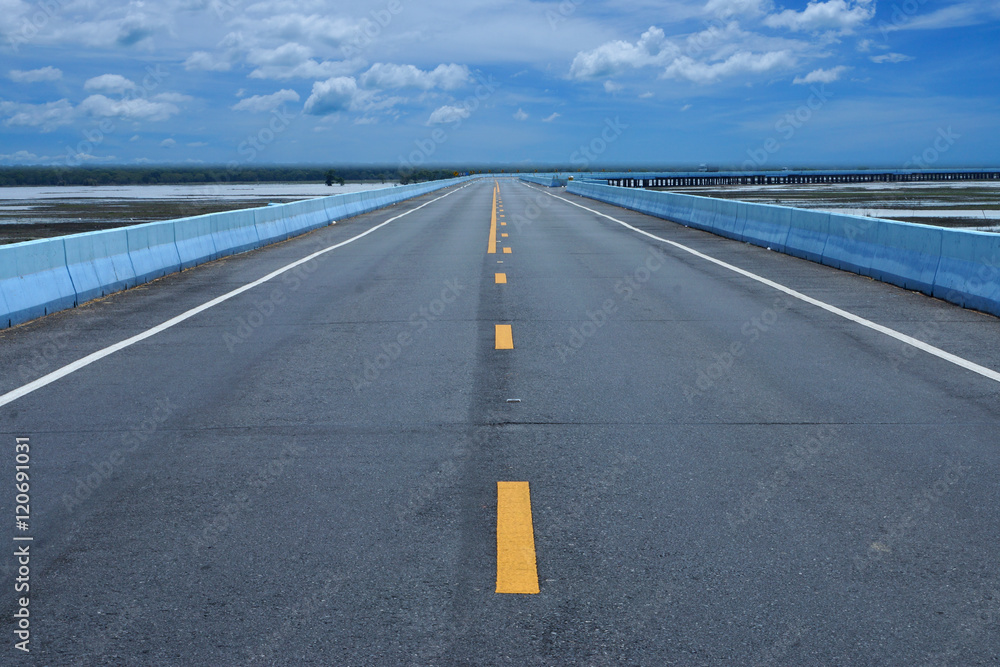 Empty road and the yellow traffic lines Empty road and the yellow traffic lines