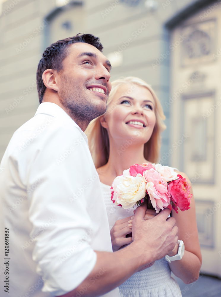couple with flowers in the city couple with flowers in the city