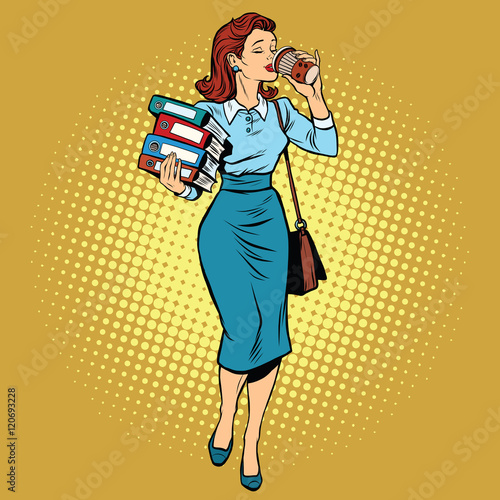 Business woman drinking coffee on the go