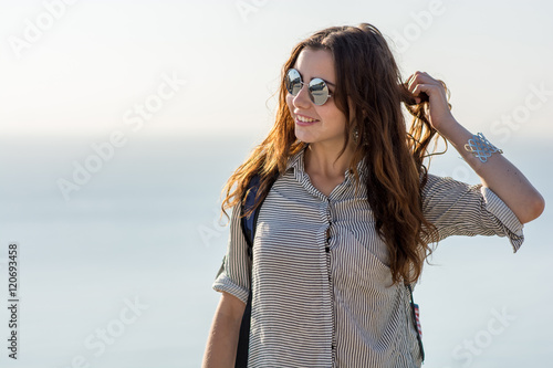 female traveler admiring a marine view