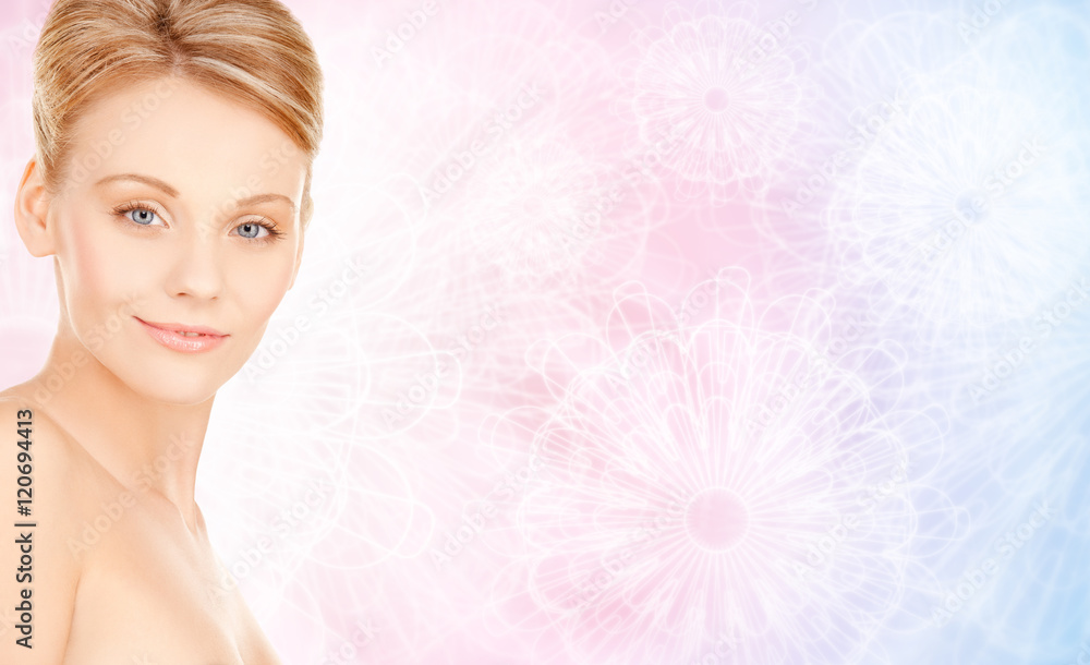 Naklejka premium beautiful young woman face over beige background