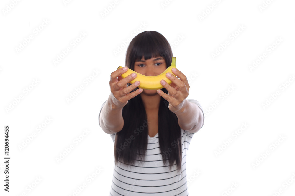 Afro Young Girl Holding Banana Towards Camera Afro Young Girl Holding Banana Towards Camera