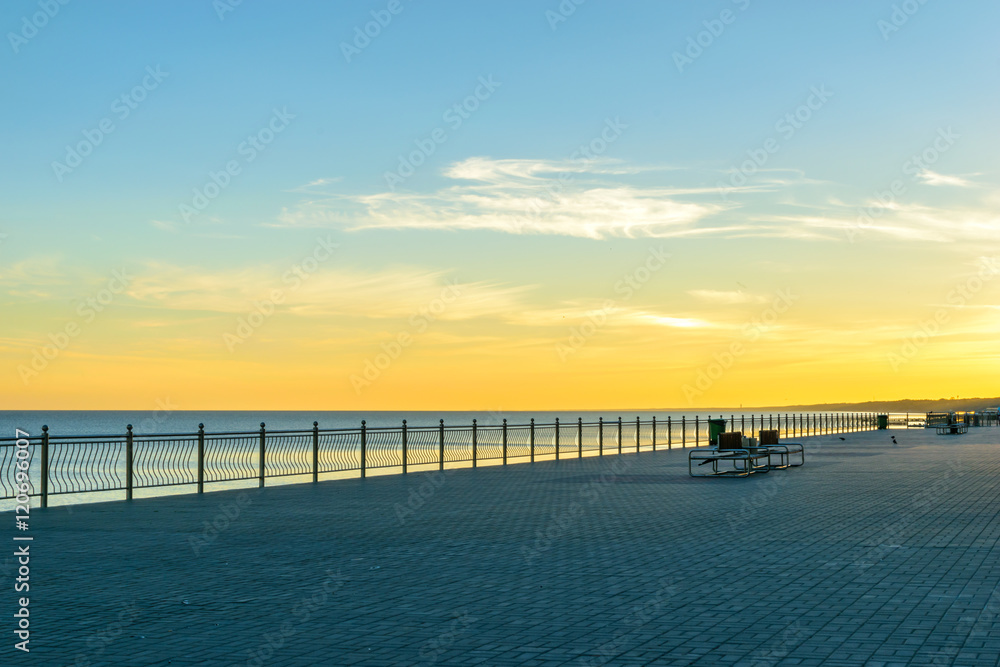 A deserted boardwalk town of Zelenogradsk on the dawn. The view of the Baltic sea