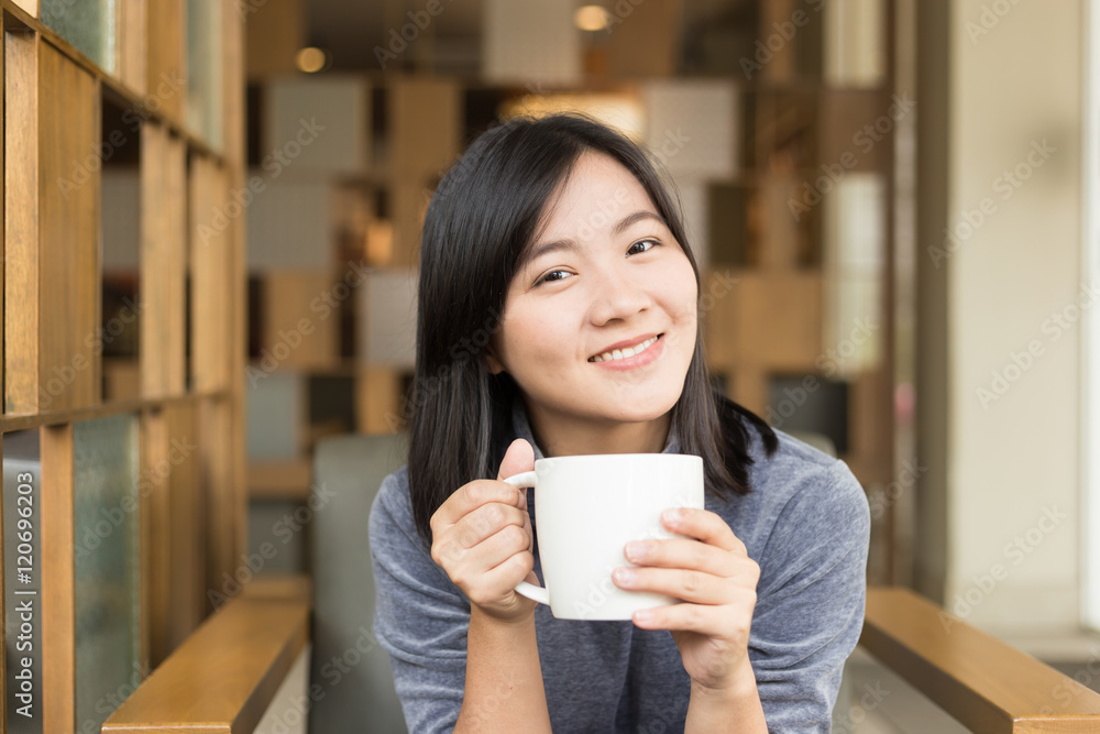 Woman drinking coffee in the morning at cafe Woman drinking coffee in the morning at cafe