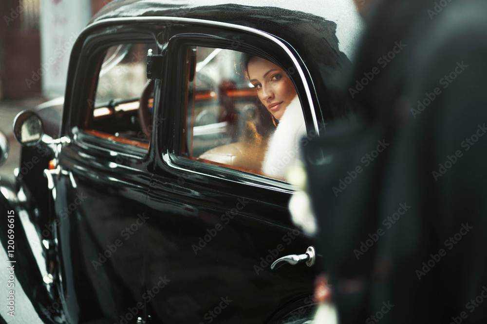 young and beautiful bride sitting in the wedding cortege young and beautiful bride sitting in the wedding cortege