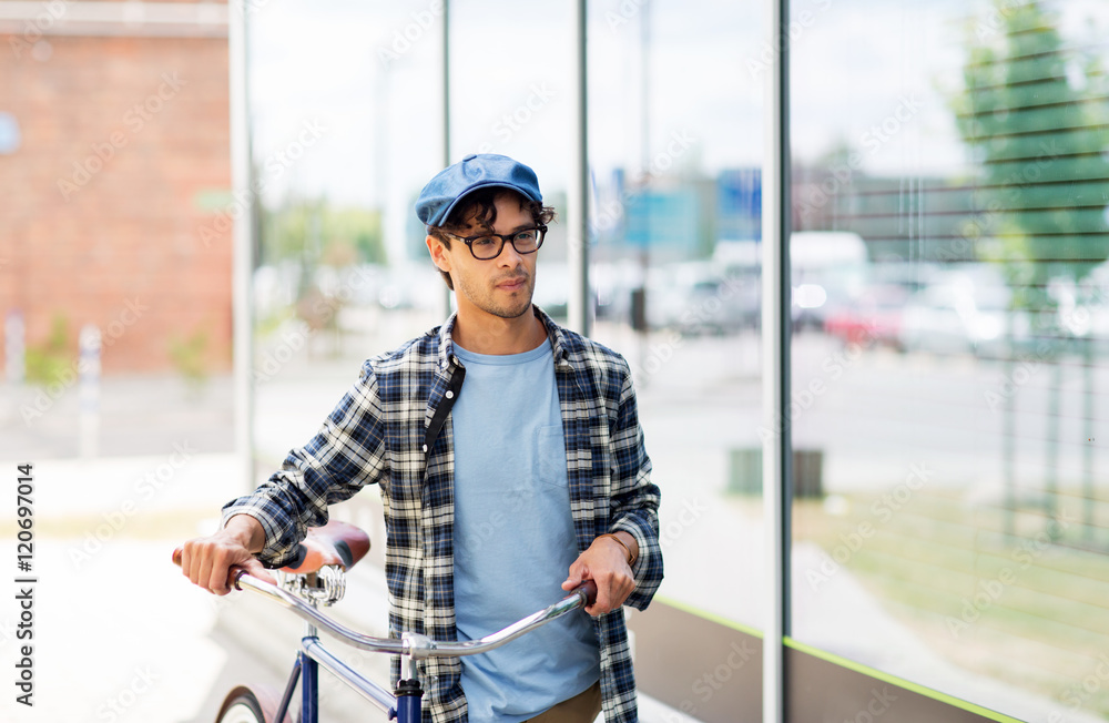 hipster man walking with fixed gear bike hipster man walking with fixed gear bike