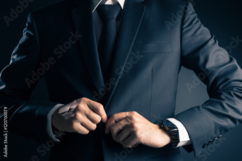Businessman Dressing Up a Black Suit