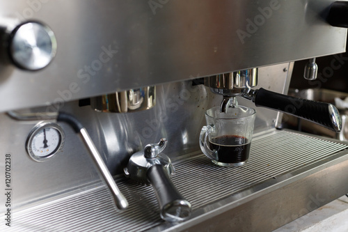 coffee making process from coffee machine in cafe shop