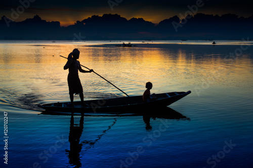 Beautiful sky and Silhouettes of fisherman at the lake, Thailand © noppharat