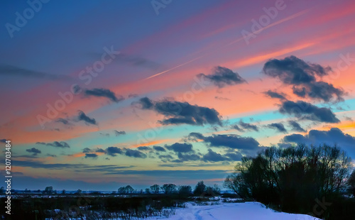 Fototapeta Naklejka Na Ścianę i Meble -  Winter Landscape With Pink Clouds At Sunset