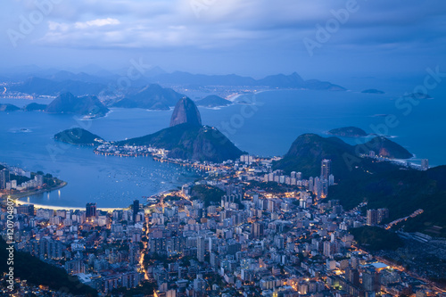 Brazil, Rio De Janeiro, Cosme Velho, View of Sugar Loaf mountain and Botafogo Bay from Cocovado at night photo