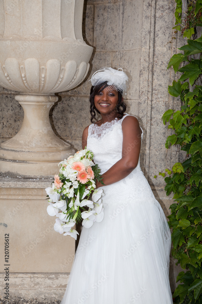 Gorgeous african american bride outside posing and smiling