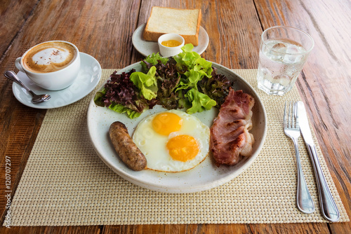 American breakfast on wooden table