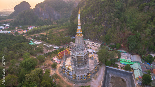 pagodas beside stair along the way to hilltop
of Wat Thumsuar or Tiger cave temple in Krabi province Thaiuland the highest temple in the south of Thailand photo