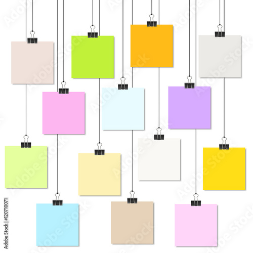 colored papers with binder clips