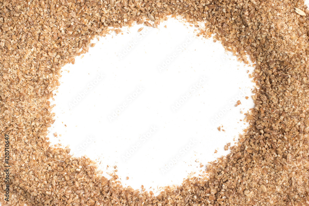 Ground Wheat into a spoon. Trigo para quibe. Kibbeh