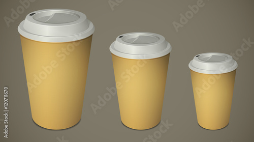 Three take-out coffee cups with caps